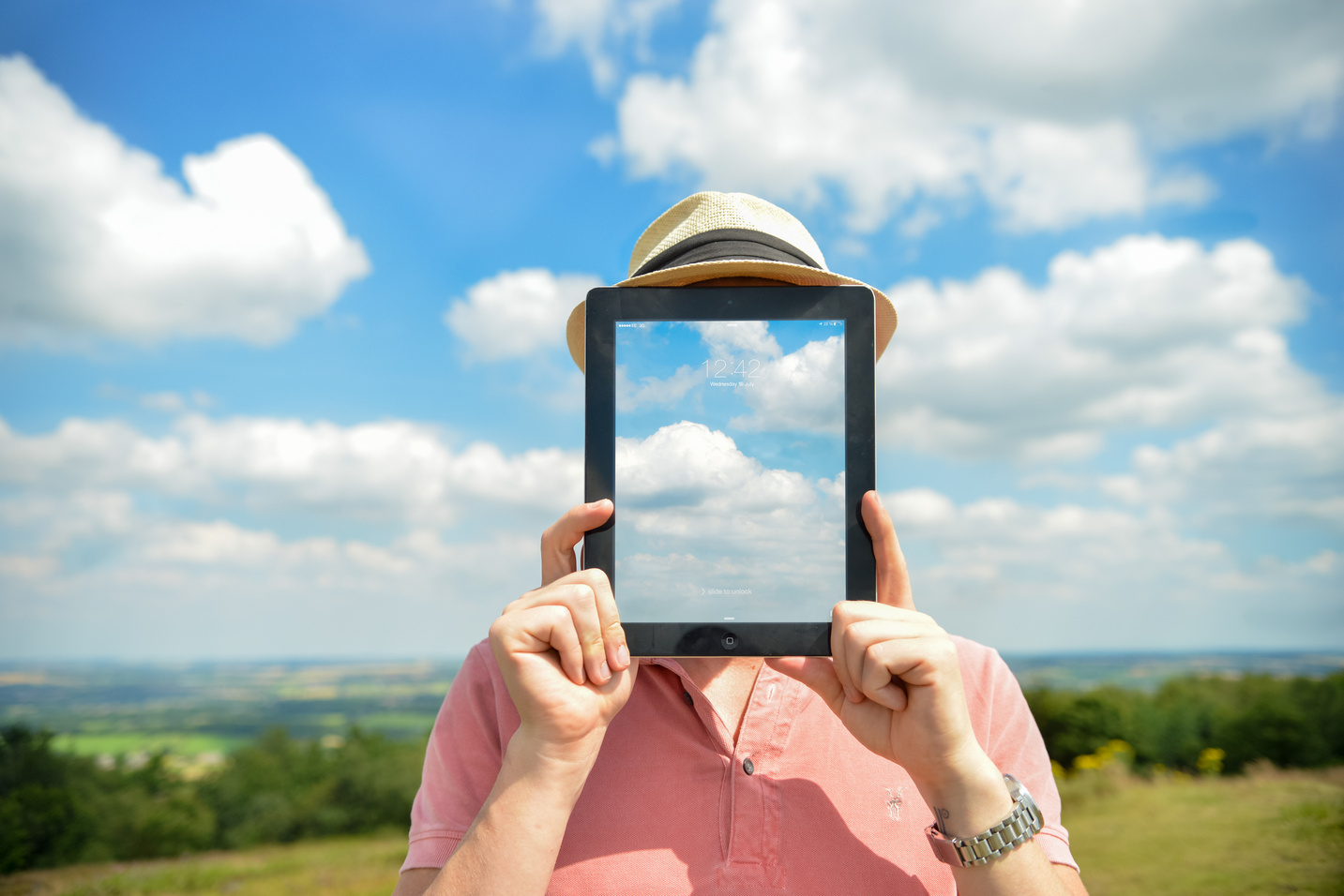 Person Holding Black Ipad